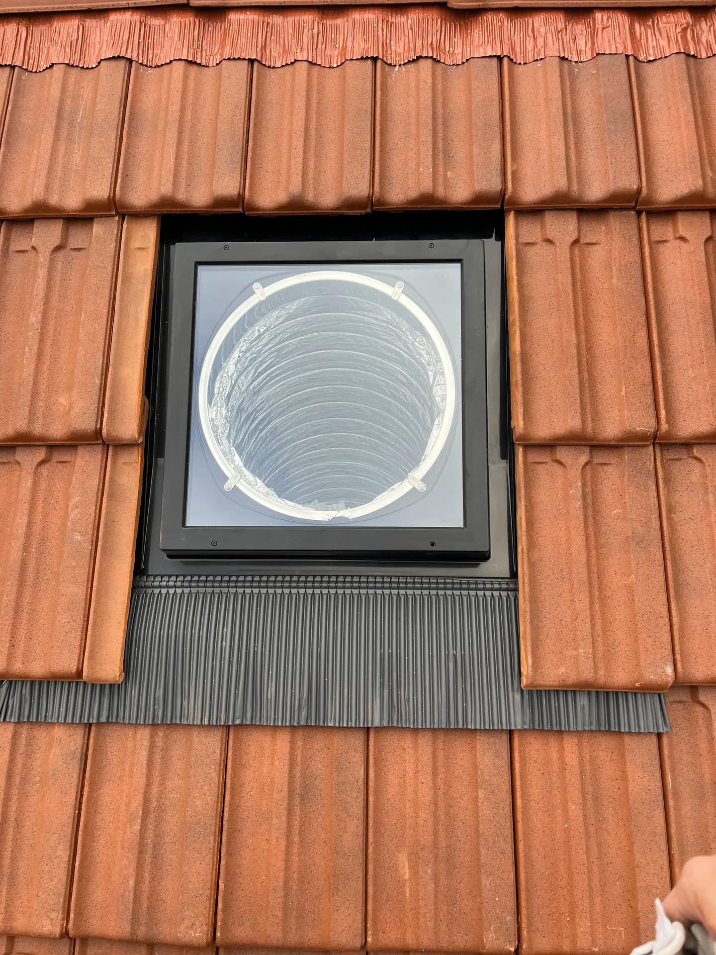 Puits de lumière et étanchéité sur toiture en tuiles